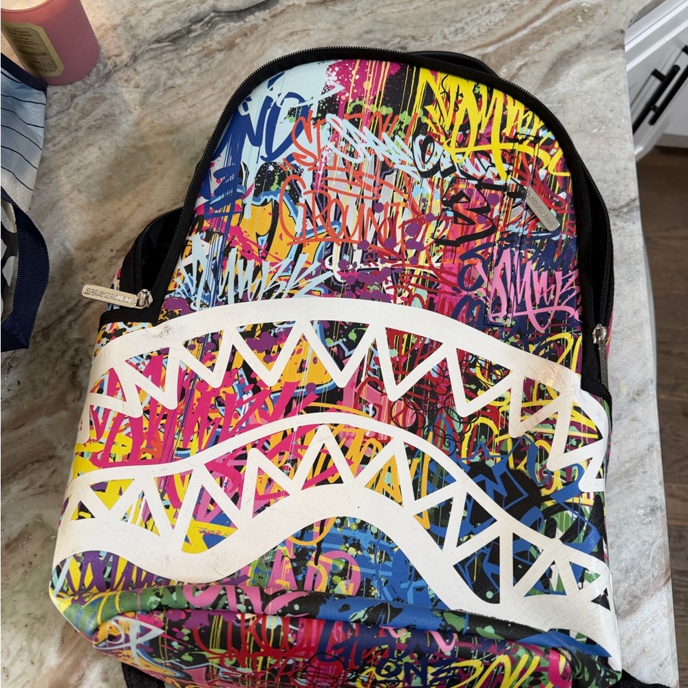 Sprayground Black Backpack with Red Limited Edition Patch